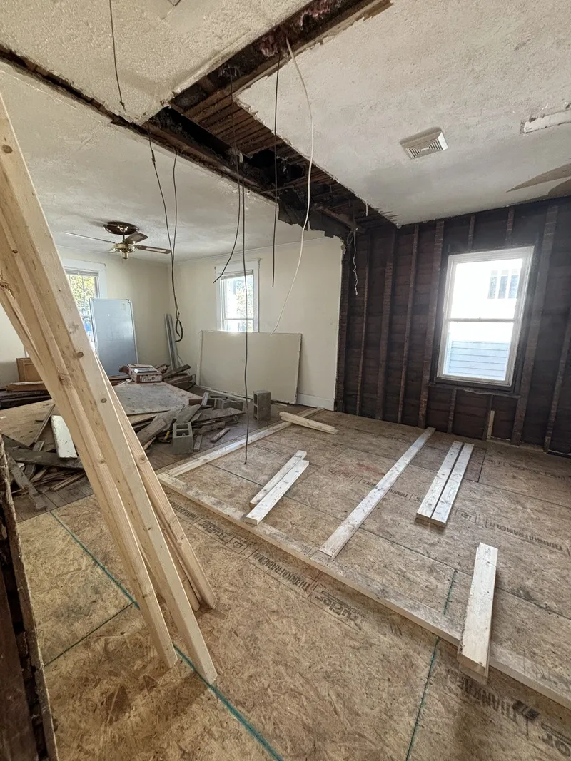 Interior framing showing down-to-the-studs renovation, the kind of value-add property we buy